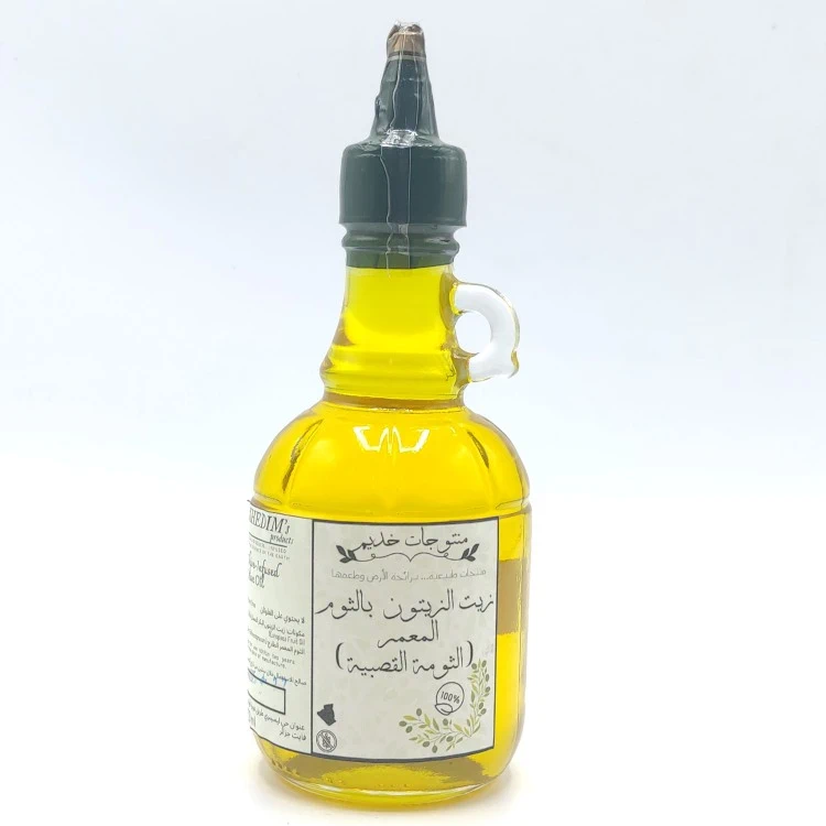 Huile d'olive à la ciboulette (owl reed) - زيت الزيتون بالثوم المعمر (الثومة القصبية) - Image 1